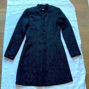 Classic  black trench coat- fully lined. With beautiful shiny black bottons